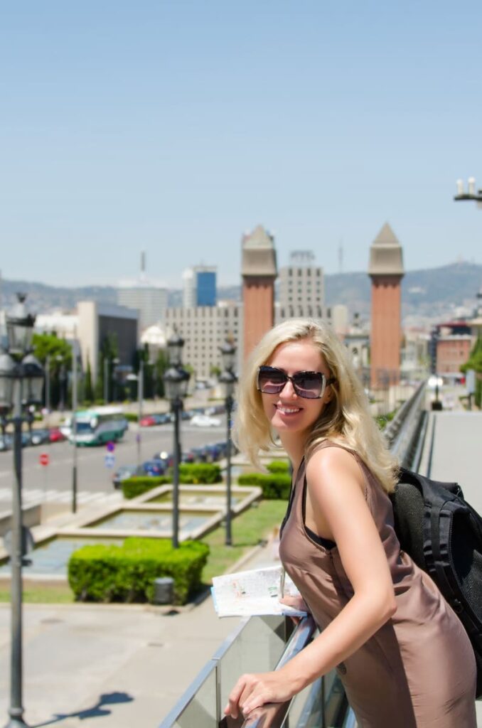 woman wearing sunglass in a sunny day in Barcelona in July