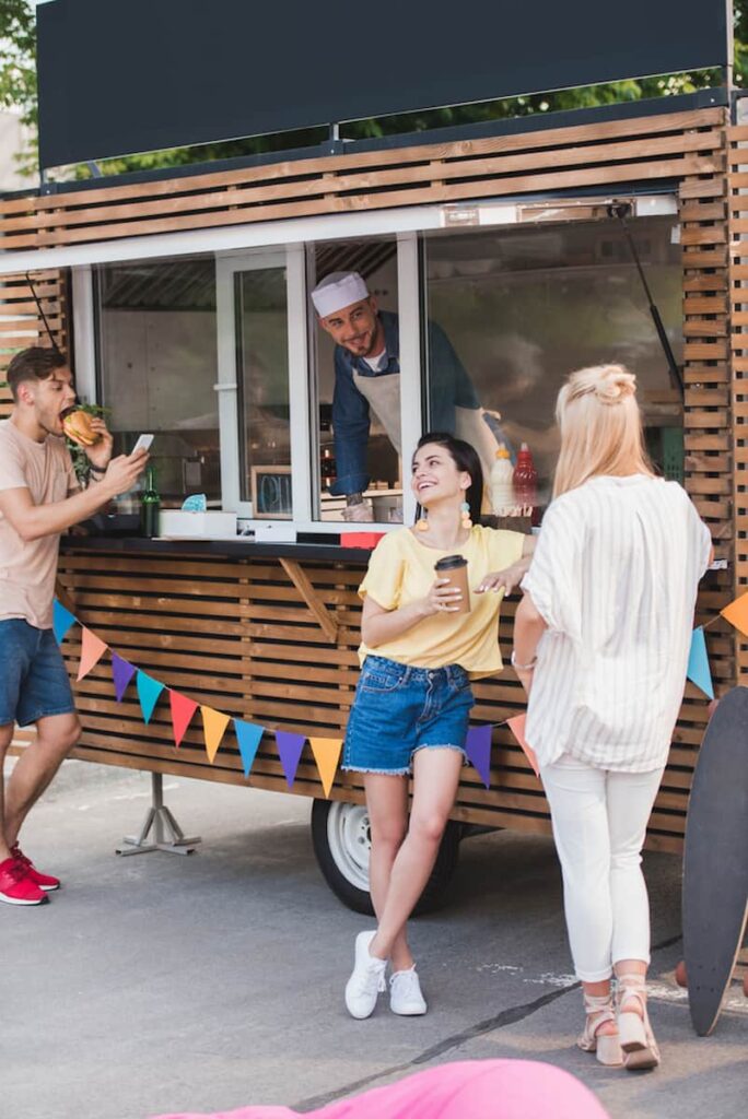 people enjoying Spanish street food in Barcelona in September