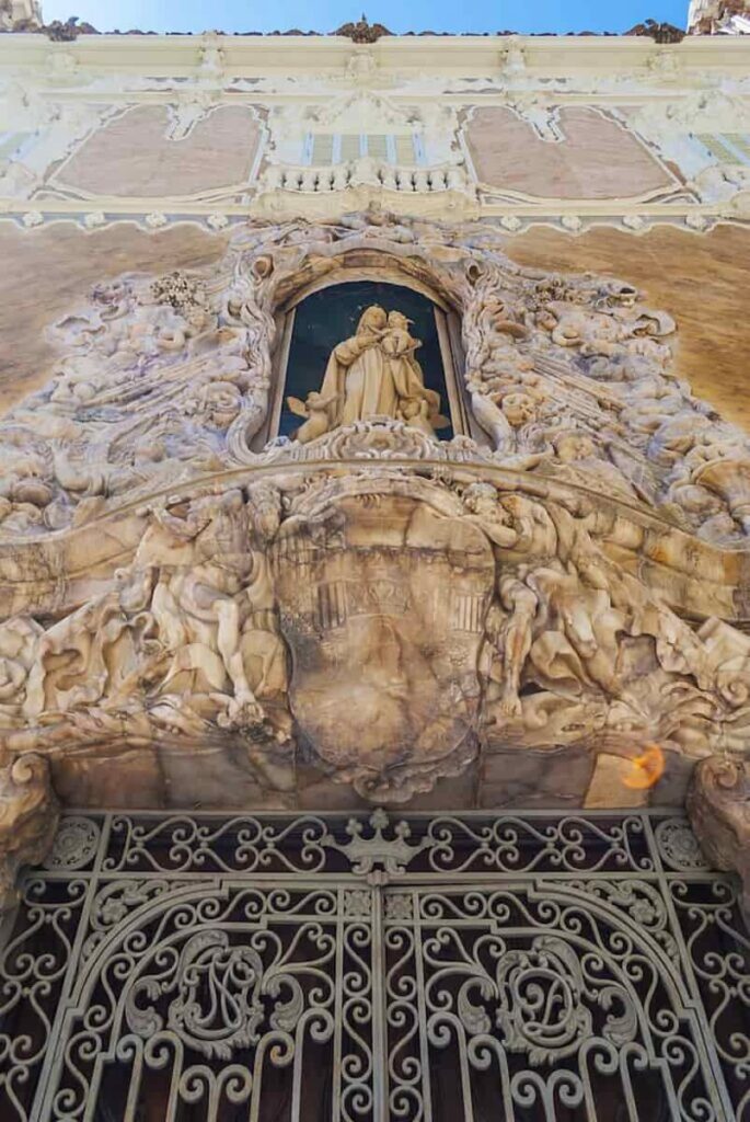 Highly decorated facade and door to the building of National Ceramics Museum in Old Town Valencia