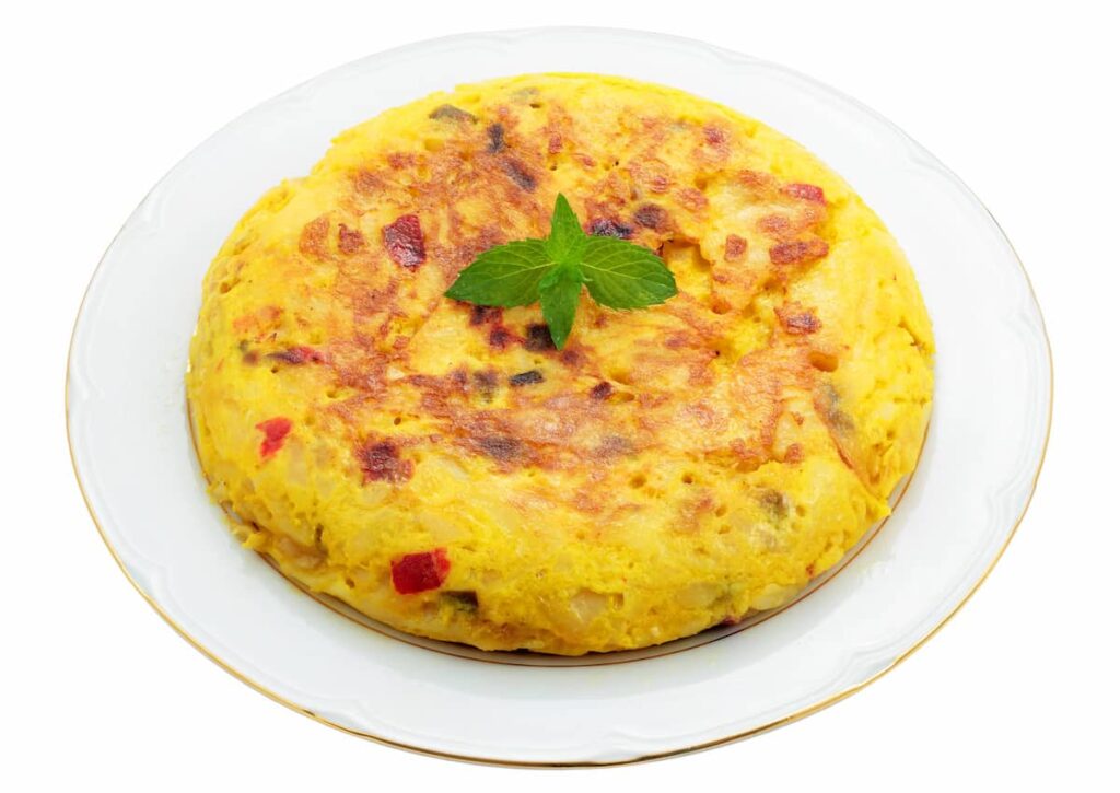 Tortilla Española a delectable Spanish omelette made with eggs, potatoes, and onions in barcelona food