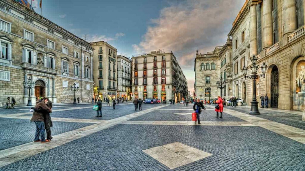 Plaça Sant Jaume is a central square in Barcelona, serving as the political heart of the city and home to the City Hall and the Palace of the Generalitat de Catalunya.