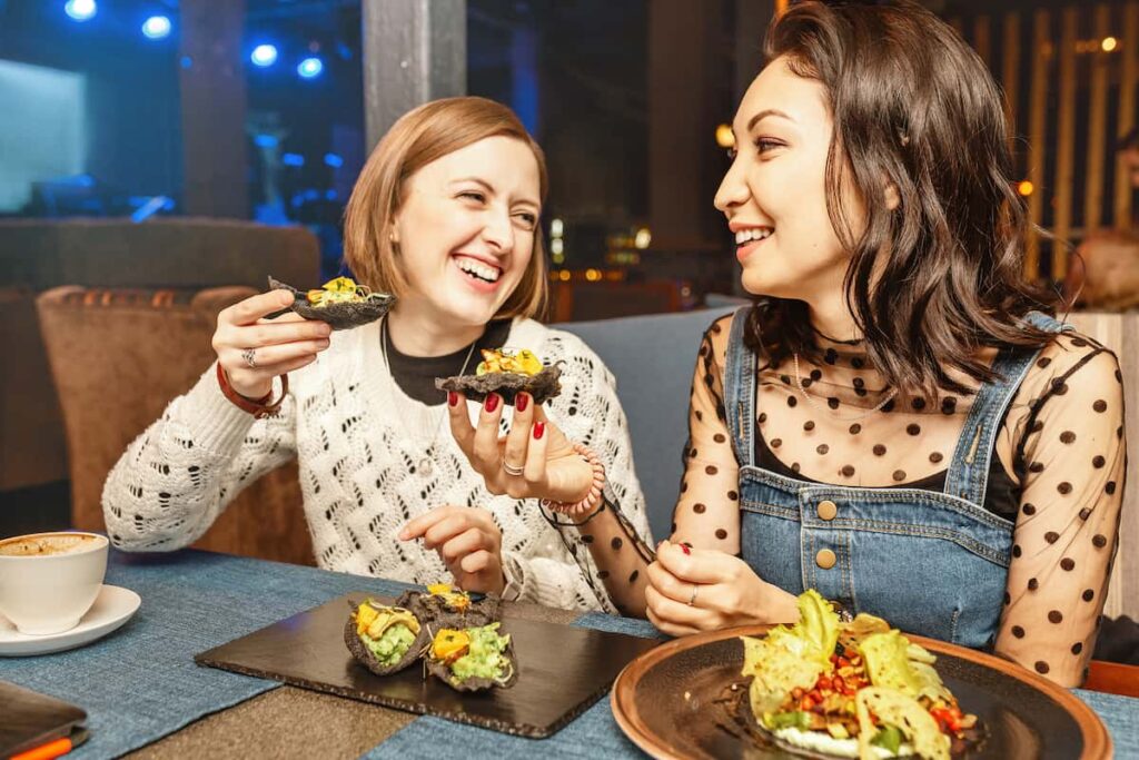 two women eating in a Restaurant in Barcelona