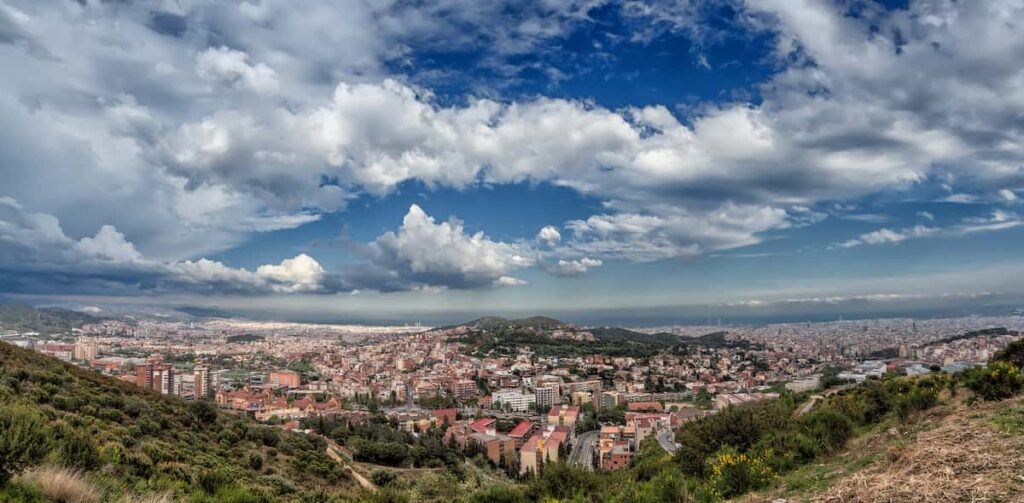 a view from a far of barcelona