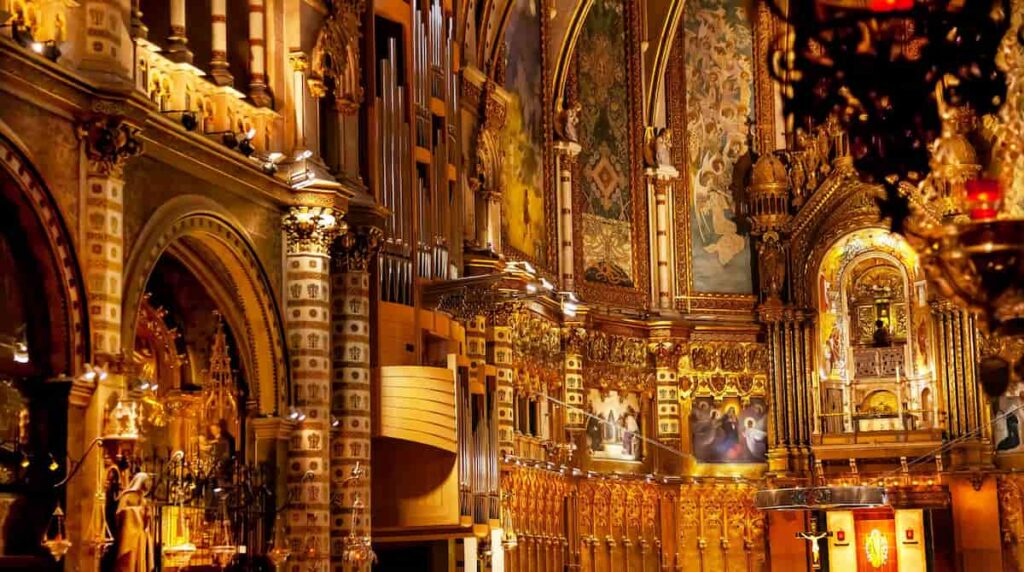 The majestic view inside of Basilica of Montserrat is one of the main things to see when doing a tour to visit Montserrat from Barcelona.