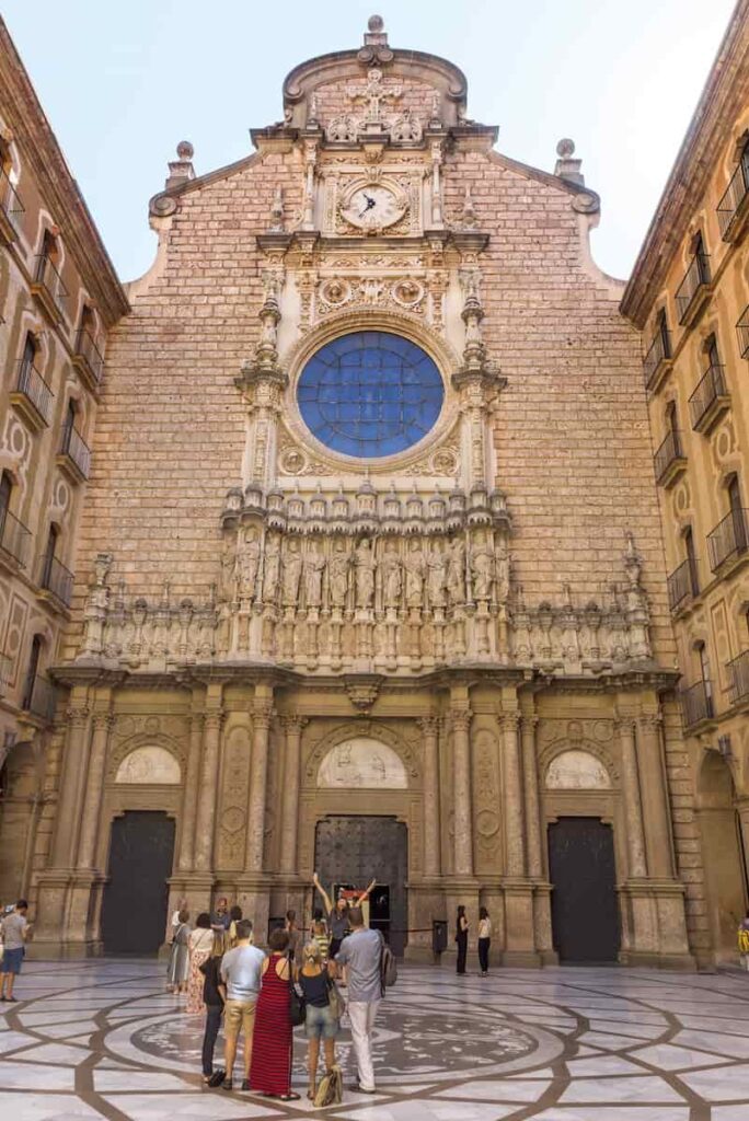 The Benedictine abbey Santa Maria de Montserrat in Monistrol de Montserrat is one of the main things to see when doing a tour to visit Montserrat from Barcelona.