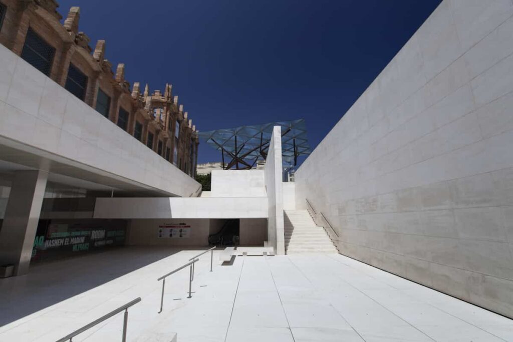a white minimalist architecture of cultural center CaixaForum 