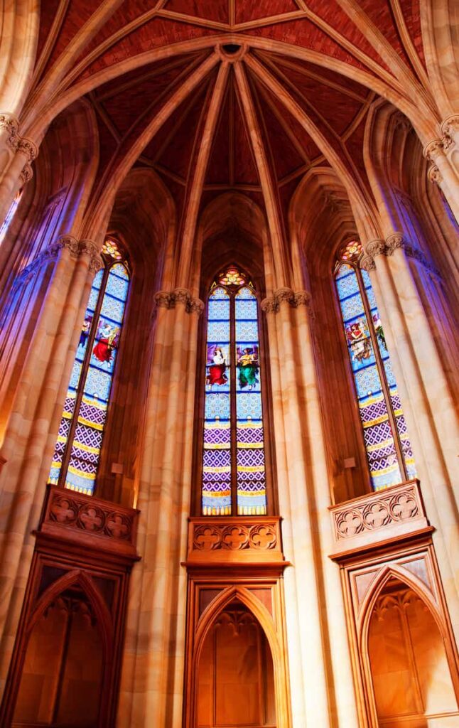 Arched ceiling with stained glass windows in cathedral of the sea in barcelona