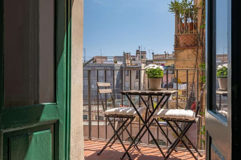 Spanish old house with beautiful balcony in hotel near olympic stadikum barcelona