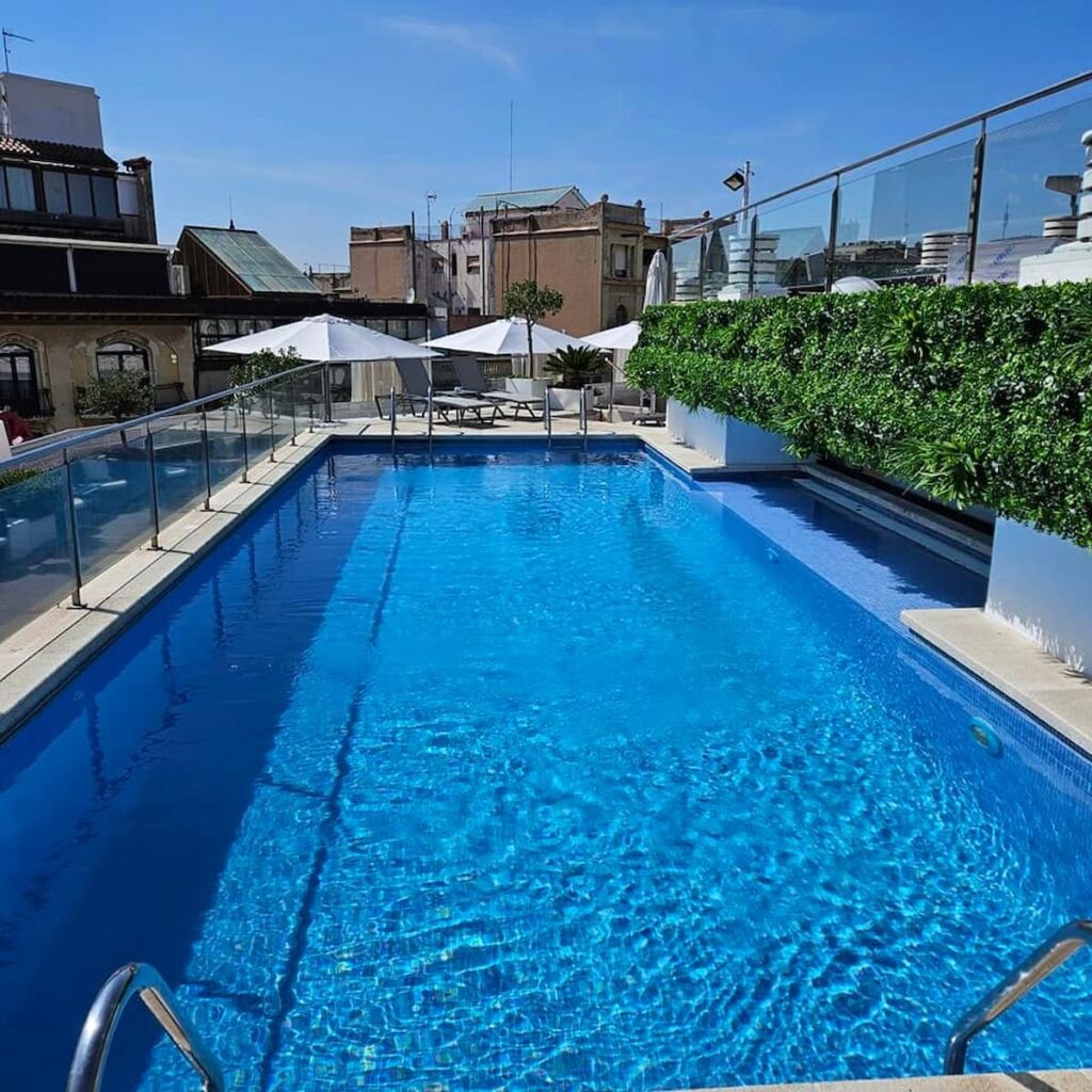 a large pool on one of the 4 star hotels in Barcelona