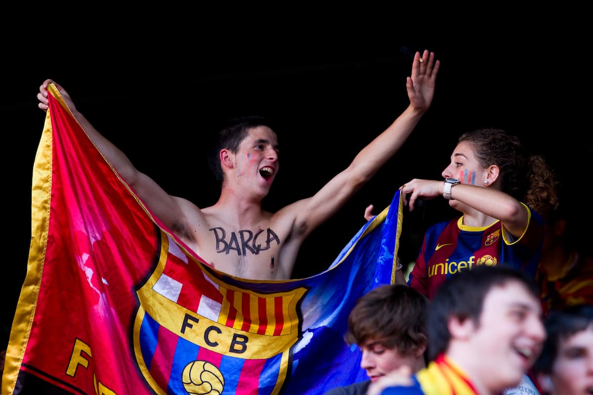 FC Barcelona supporter with Barça on his chest, one of the nicknames for Barcelona