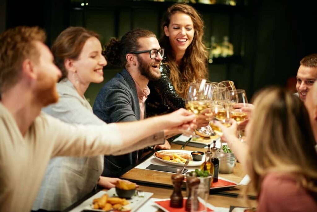 a group of tourist enjoying their dinner