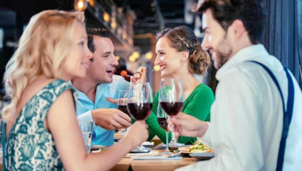 a group of tourist having dinner