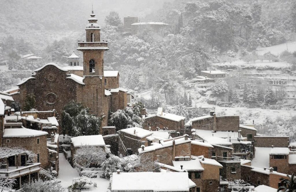 Spanish village with snow showing an example of the winter weather in Spain in December