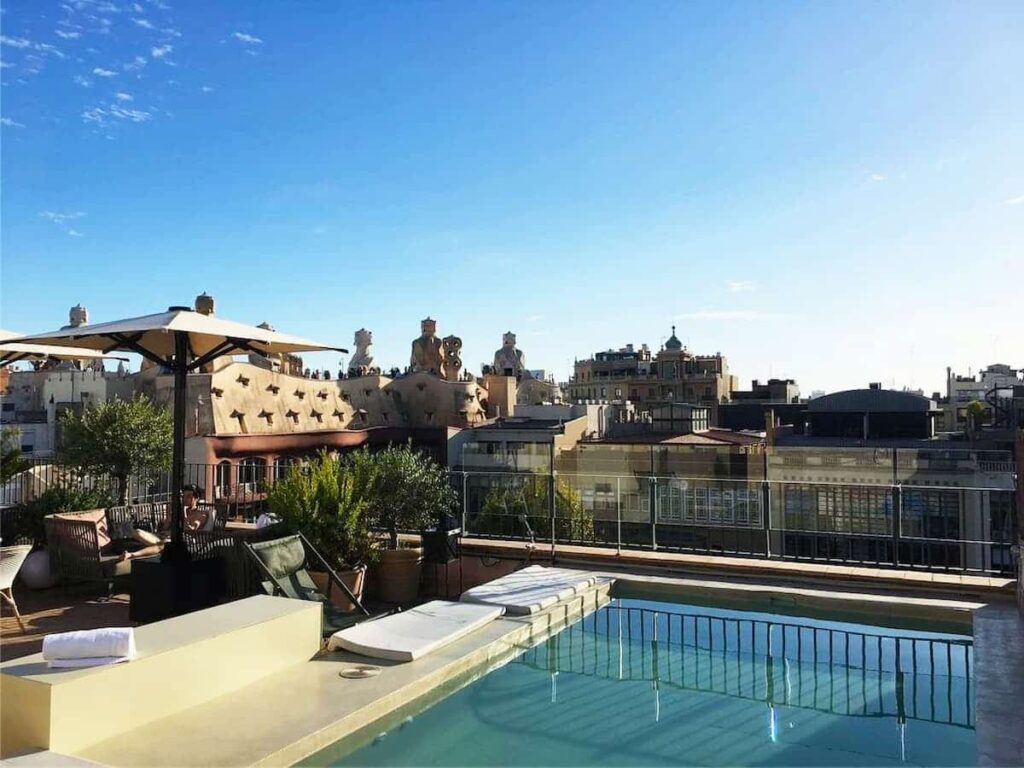 Stunning view in the rooftop of H10 Casa Mimosa with swimming pool. One of the best Boutique hotels in Barcelona.