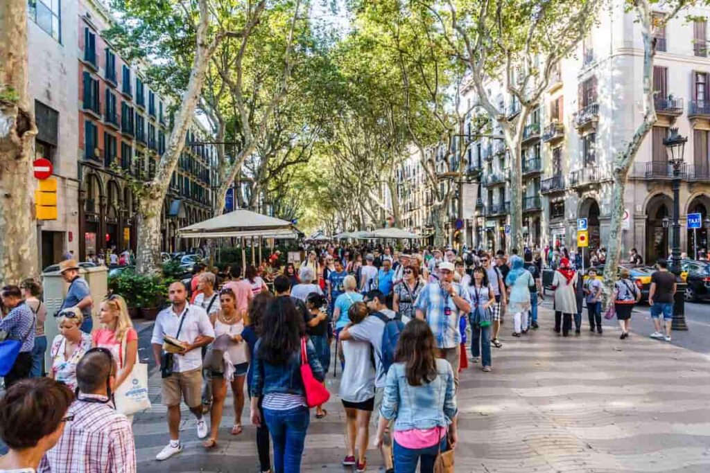 Crowd of tourists in Barcelona. One of the best reason why visit Barcelona.